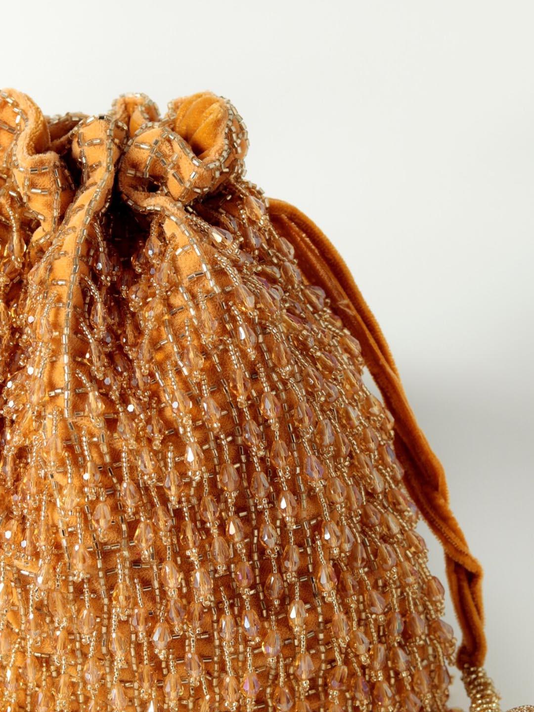 Gold Embellished Potli Bag with Decorative Handle