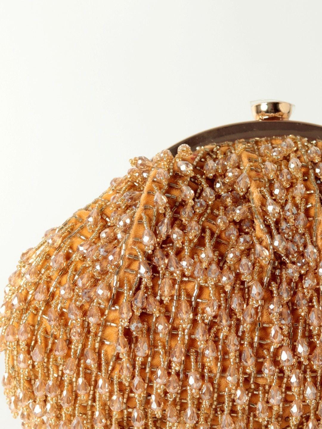 Gold Embellished Potli Bag with Decorative Handle